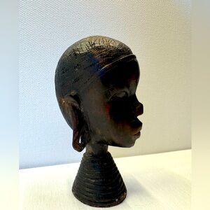 Handcrafted Wooden Bust of an African tribal woman.